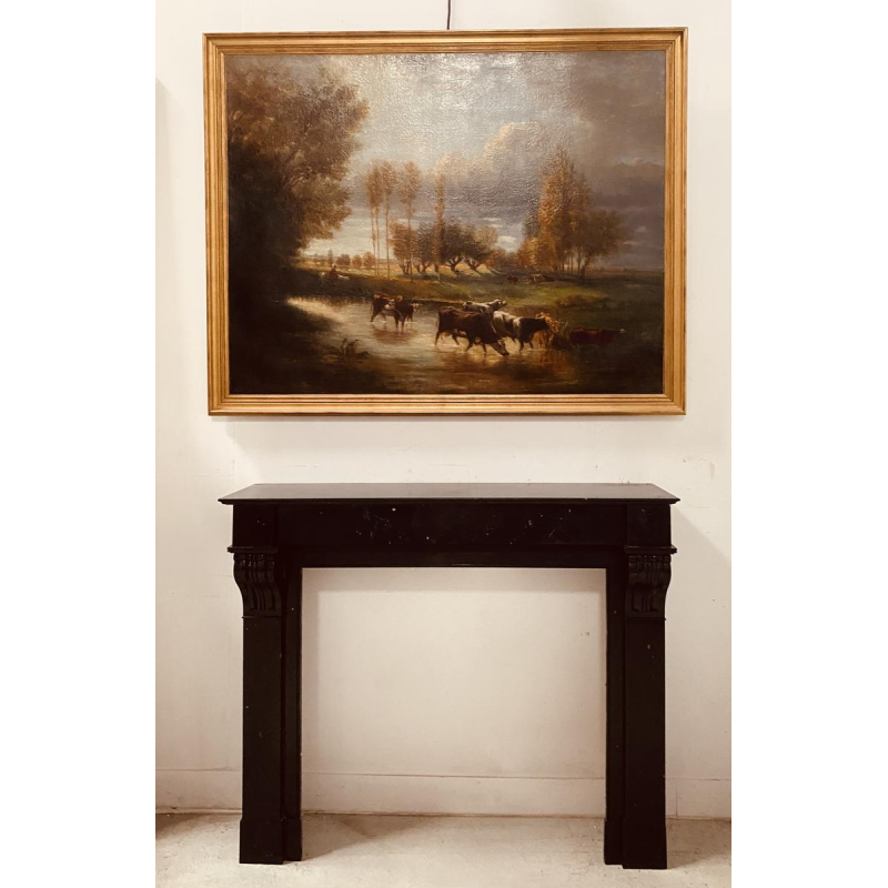 Cheminée époque Napoléon III à décor de corbeaux, marbre noir, XIXe siècle